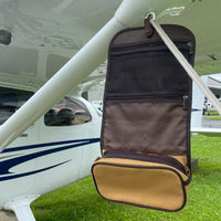 Flight Outfitters - Bush Pilot Dopp Kit hanging on airplane